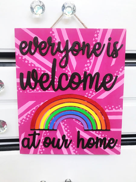 Wood Pride welcome sign, painted pink