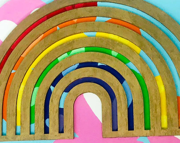 Closeup of round rainbow Pride hanging decoration